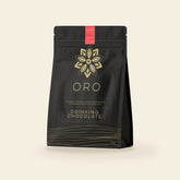 Oro Aphrodisiac drinking chocolate, 12oz pouch, on a cream background