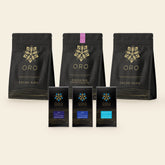 Cacao Connoisseur Bundle contents: Tuma, Opayo and Single Origin Dark 78% bars in front of pouches of cacao nibs, Ceremonial drinking chocolate and cacao husk tea