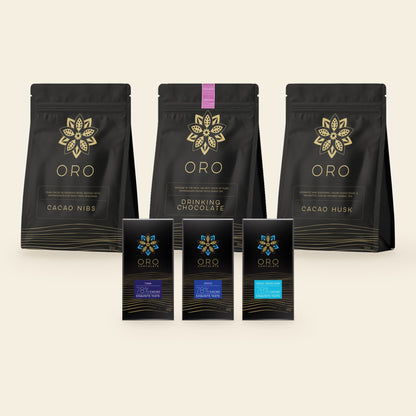 Cacao Connoisseur Bundle contents: Tuma, Opayo and Single Origin Dark 78% bars in front of pouches of cacao nibs, Ceremonial drinking chocolate and cacao husk tea