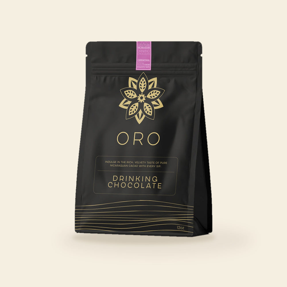 Oro Ceremonial drinking chocolate, 100% cacao, 12oz pouch, on a cream background