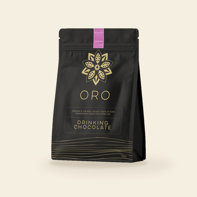 Oro Ceremonial drinking chocolate, 100% cacao, 12oz pouch, on a cream background