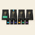 Origin corporate gift box contents: the five-bar Origin Explorer flight, the 88% Extra Dark bar, drinking chocolate, single-origin coffee, cacao nibs and cacao husk tea