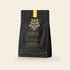 Oro Golden Milk Chai drinking chocolate, 12oz pouch, on a cream background
