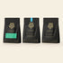 Oro Drinks Bundle contents: a bag of single-origin coffee, a pouch of Single Origin drinking chocolate and a pouch of cacao husk tea