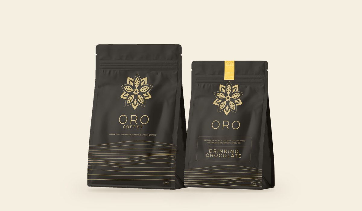 A bag of Oro coffee beside a pouch of Oro drinking chocolate