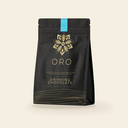 Oro Single Origin drinking chocolate, 12oz pouch, on a cream background